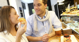 Couple in Madrid eating Spanish savouries