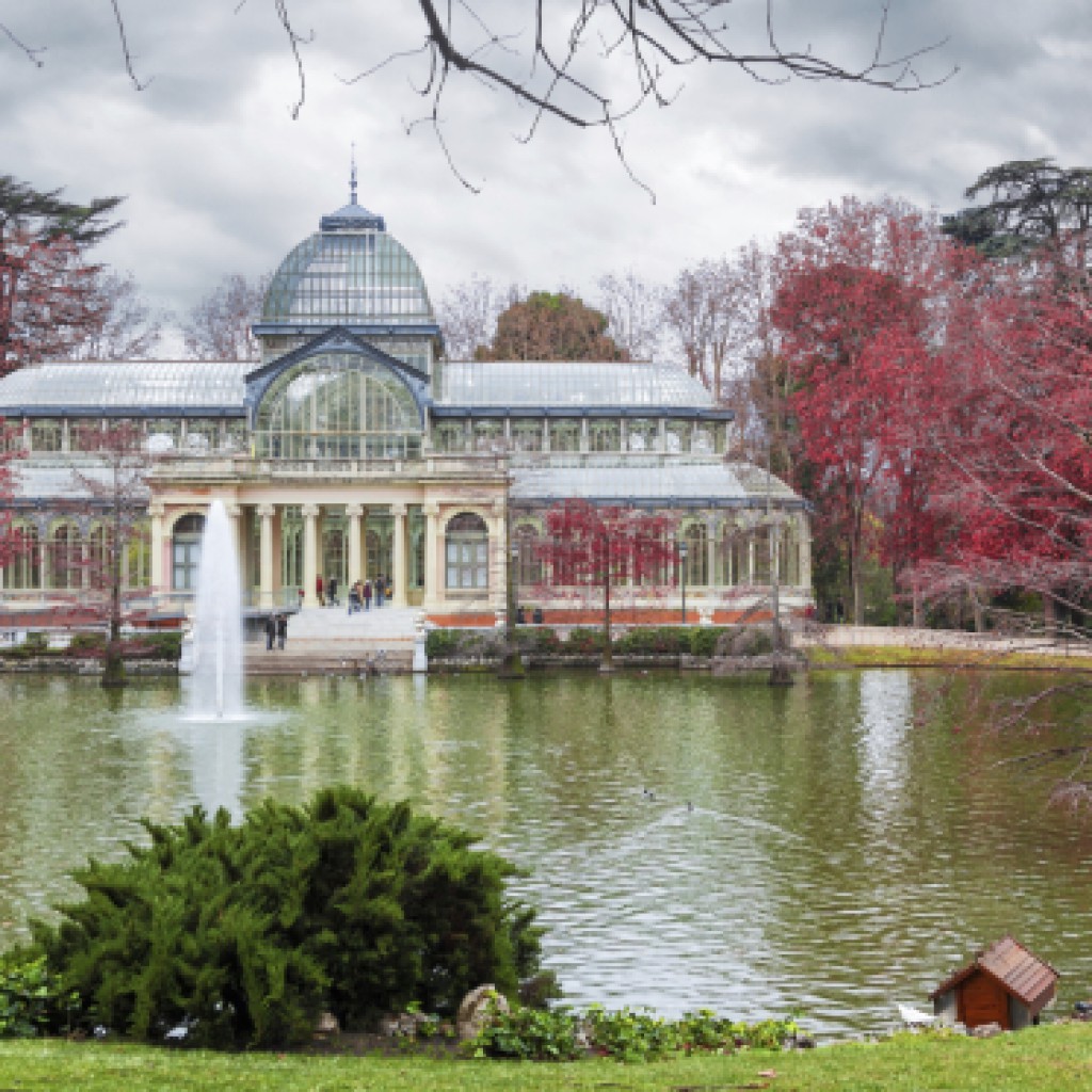 The Palacio de Cristal over the lake in Madrid at winter, Spain