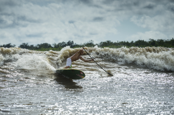Robby Naish surfs a river tidal wave in Arari, Brazil on May 17th, 2014