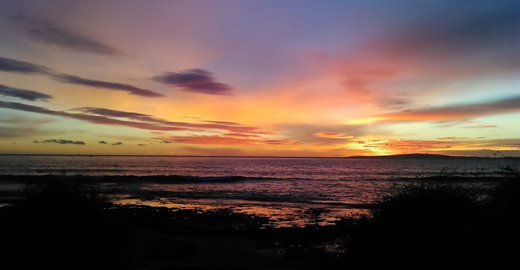 Playa de Carnatge, al atardecer. Carlos A. Zamora (Flickr)