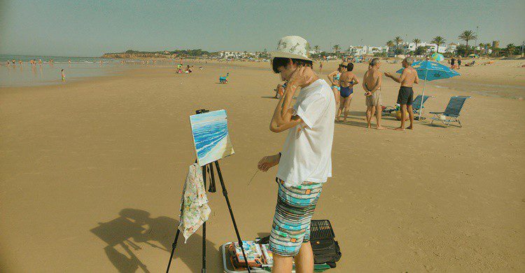 Pintor en la playa de La Barrosa. Eleazar (Flickr)
