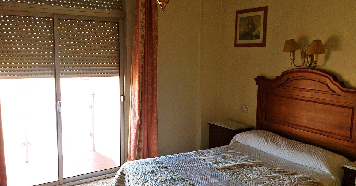 Imagen de una de las habitaciones del hotel Joma 