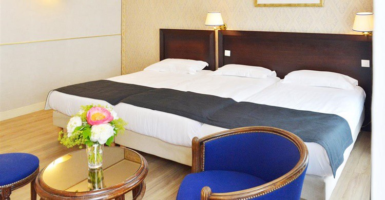 Habitación triple del Unic Hotel. (http://en.hotel-unic.com/)