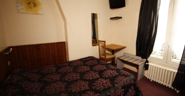 Imagen de una de las habitaciones del hotel Wattignies (http://www.wattignieshotelparis.com/es/)