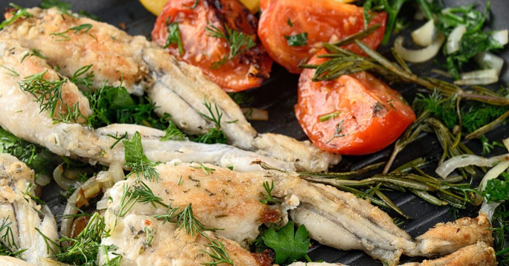 imagen plato ancas de rana a la plancha tomate