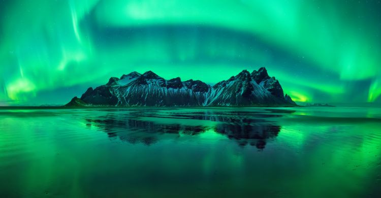 Auroras boreales en Stokksnes, situado en la costa sudeste de Islandia. (Adobe Stock)